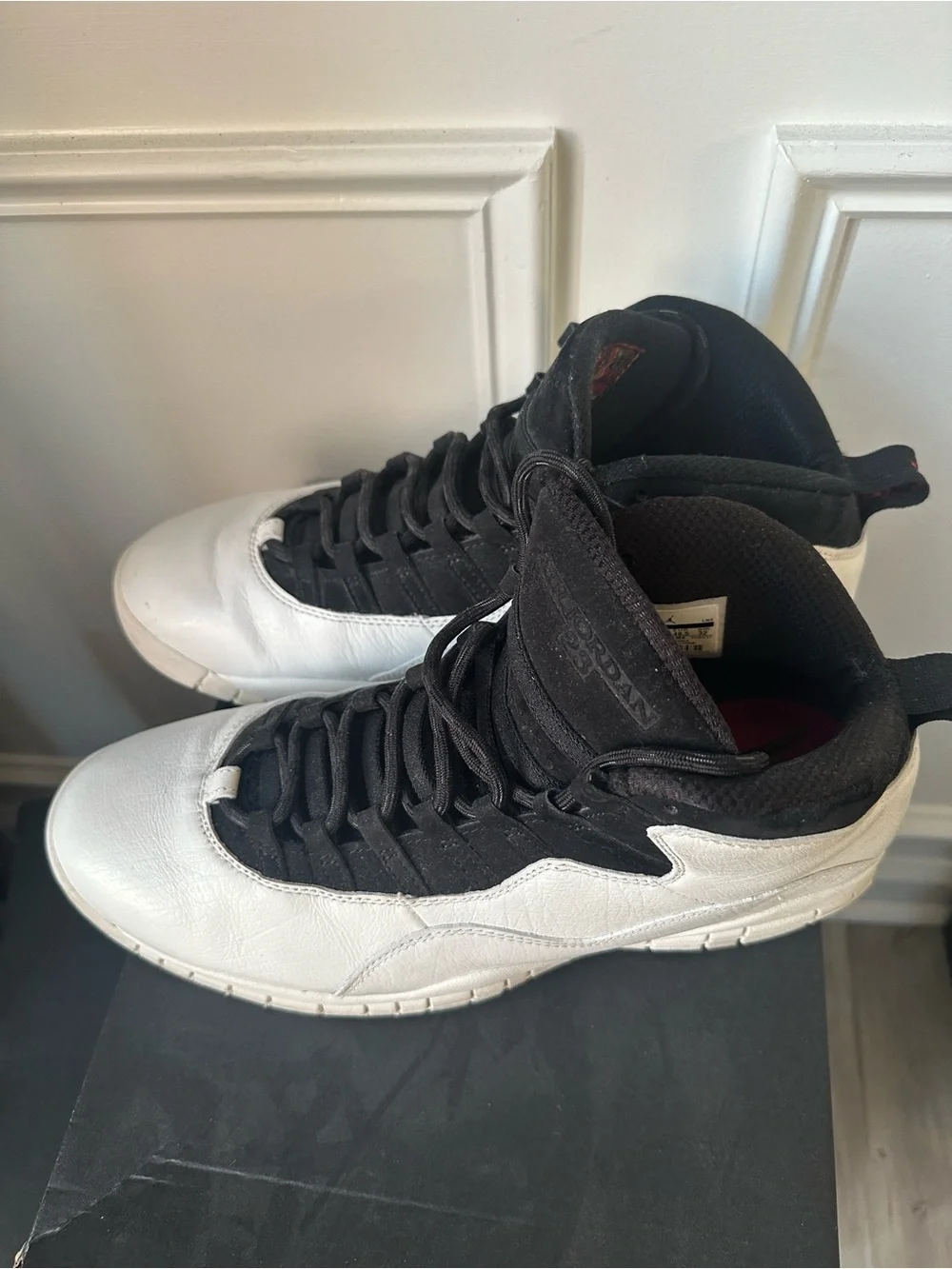 Jordan Black and White High-Top Sneakers with Red Liner
